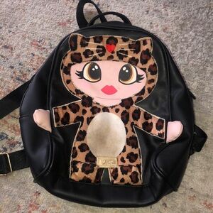 Adorable Betsy Johnson mini backpack purchased at Dillards Dept store.